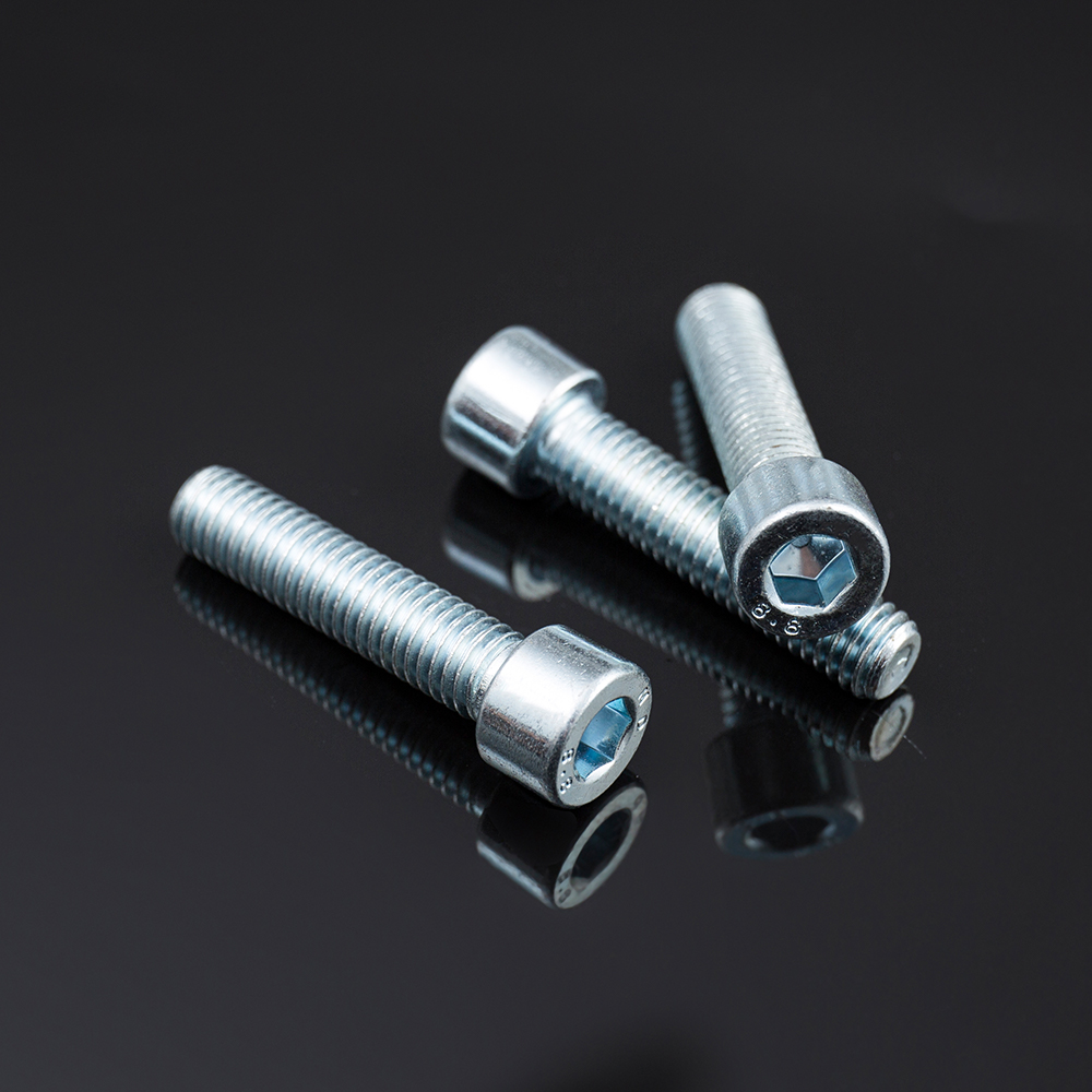 Tornillo de máquina con casquillo hexagonal